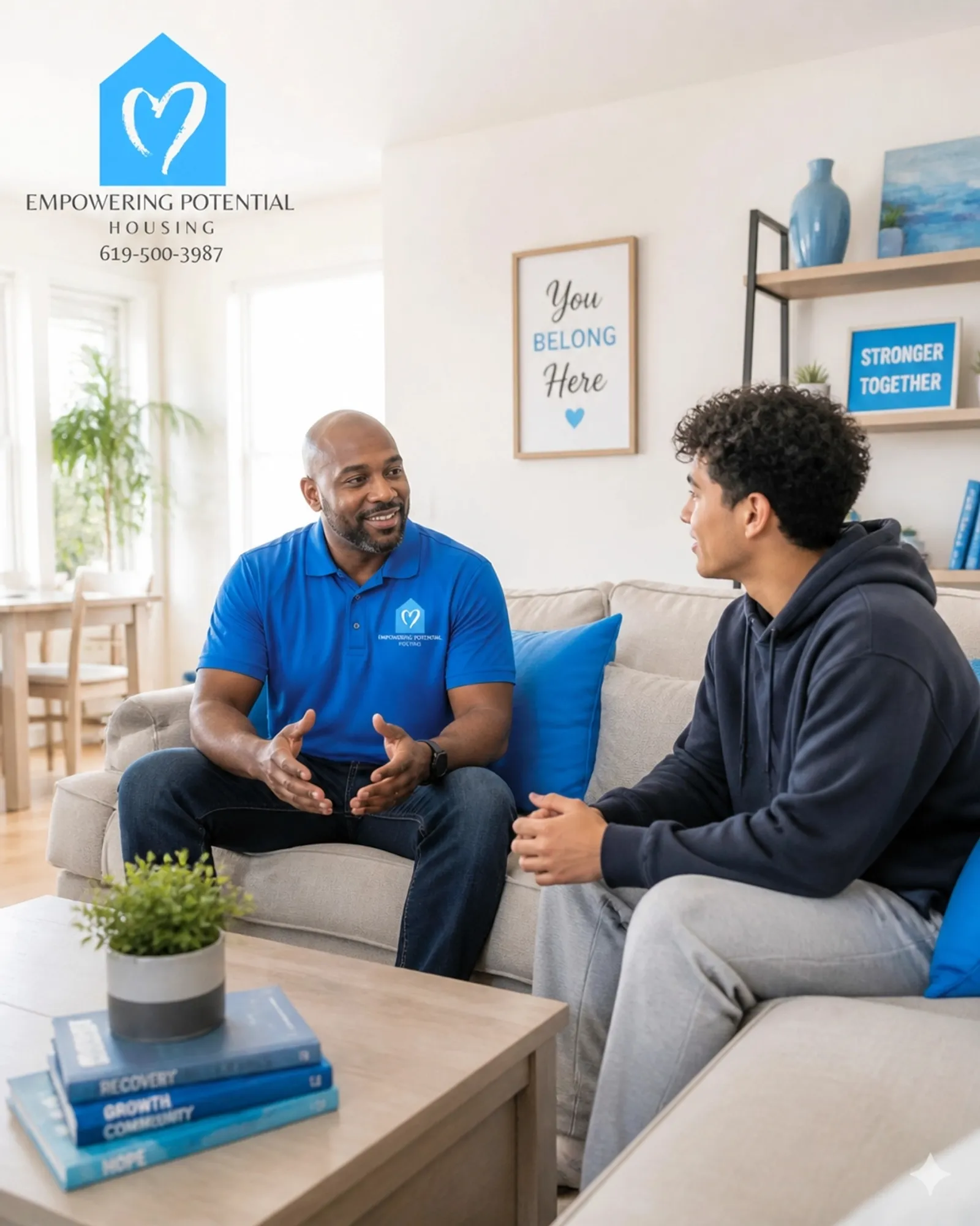 A mentor talking with a resident in a welcoming recovery home