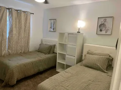 Bright shared bedroom in the women’s house